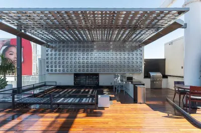 a large room with a fireplace in a building at The W Hotel Residence With Roof Top Pool, Gym Plus 2 Free Valet Parking spaces in Los Angeles