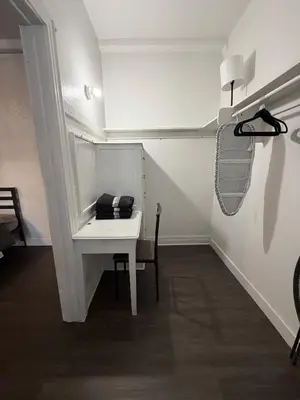 a room with a white desk and a chair at Wilshire Center K-Town Studio in Los Angeles