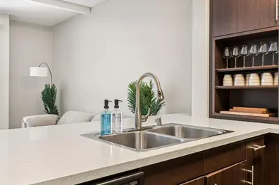 a kitchen with a sink and a counter at Chic Marina Oasis 5 star Amenities Central in Los Angeles