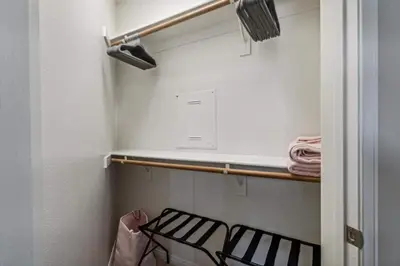 a walk in closet with a rack and a shelf at Cozy Marina Hideaway Gym Pool & Spa Central in Los Angeles
