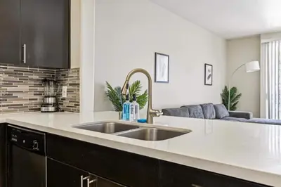 a kitchen with a sink and a counter top at Cozy Marina Hideaway Gym Pool & Spa Central in Los Angeles