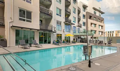 an image of a swimming pool in a apartment building at BOHO Style Home LA -Free Parking 10min To Cedars in Los Angeles