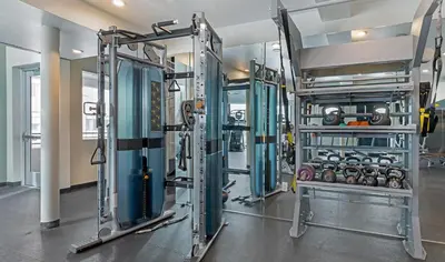 a gym with several tread machines in a room at BOHO Style Home LA -Free Parking 10min To Cedars in Los Angeles