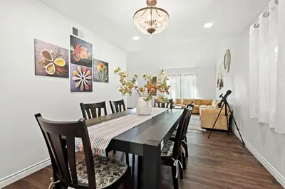 a dining room with a table and chairs at Cozy Full Bedroom Shared Home Great Value in Norwalk