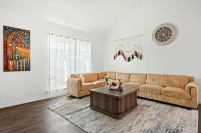 a living room with a couch and a coffee table at Cozy Full Bedroom Shared Home Great Value in Norwalk
