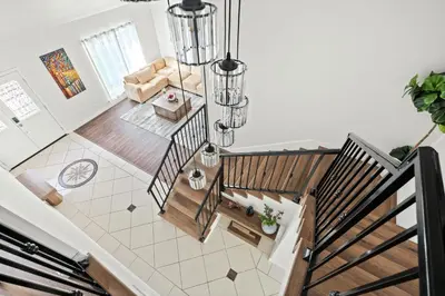 an overhead view of a living room with stairs at Cozy Full Suite Private Bathroom Quiet Stay in Norwalk