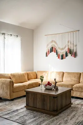 a living room with a couch and a coffee table at Upgraded Queen Suite Private Ensuite Bright Stay in Norwalk