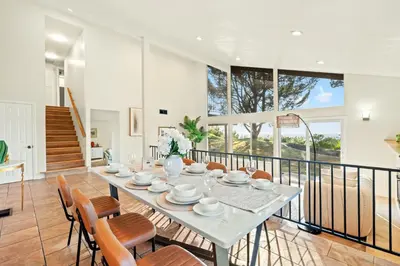 a dining room with a table and chairs at Spacious Retreat with Scenic Mountain Views in Santa Ana