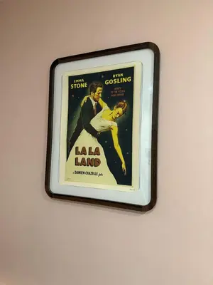 a picture of a movie in a frame on a wall at Private getaway in Studio City Hills universal in Los Angeles