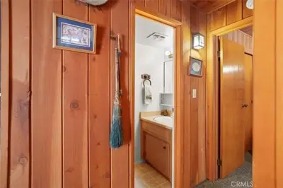 a bathroom with a sink and a mirror at Mountain Getaway - Stunning Views in Pine Mountain Club