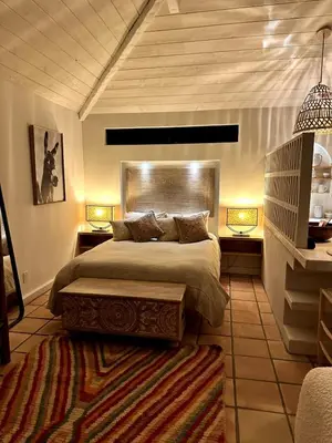 a bedroom with a large bed and two lamps at Ojai Serenity Retreat in Ojai