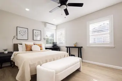 a bedroom with a bed and a ceiling fan at Elegant 3 Bedroom 2 Bathroom With EV Charging Near Santa Anita in Duarte