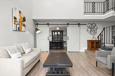 a living room with a couch and a table at Serene Hilltop Oasis Above the City w Private Pool in Hacienda Heights