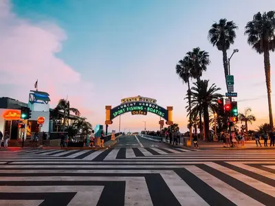 a city street with a crosswalk and a sign for a theatre at * Breathtaking Place In Santa Monica's Heart * in Los Angeles