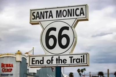 a street sign for santa monica and end of the trail at Luxurious &Spacious 1Bed 1Bath Apt In Santa Monica in Los Angeles