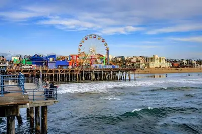 a pier with a ferris wheel on the beach at Luxurious &Spacious 1Bed 1Bath Apt In Santa Monica in Los Angeles