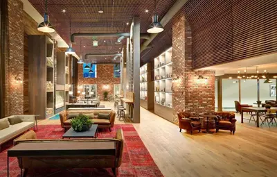 a living room with couches and chairs and a table at 5-Star West Hollywood Living | Modern & Central in Los Angeles