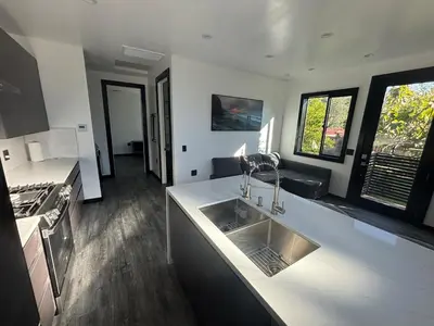 a kitchen with a sink and a counter top at Burbank - Starlight Hills Private Luxury Guest House in Burbank