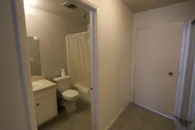 a bathroom with a toilet and a sink at 3 beds Apart in Beverly Hills in Los Angeles