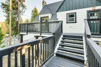 a deck with stairs in front of a house at Steps to Lake Arrowhead Village Chic Apartment in Lake Arrowhead