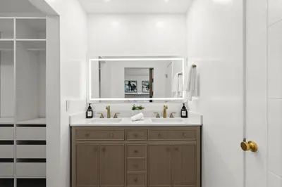 a bathroom with a sink and a mirror at NEW Remodeled Northridge 5 Bedroom Near CSUN & Sherwood Forest in Northridge