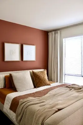 a bedroom with a large bed and a window at Designer Light-Filled WeHo Condo in Los Angeles