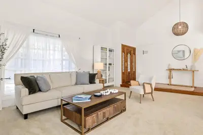 a living room with a couch and a coffee table at GOODE.HOMES | Luxury Home w/ Beautiful Garden in Santa Clarita