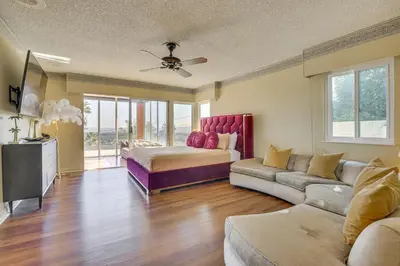 a living room with a bed and a couch at Stunning MCM Escape with Mtn Views in San Bernardino in San Bernardino