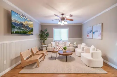 a living room with white furniture and a ceiling fan at Marbella Lane - Charming 4BR Bungalo for Relaxing Retreat in Fullerton