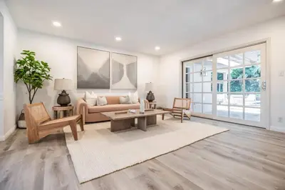 a living room with a couch and a table at Marbella Lane - Serene Ranch Style Home wPool in Fullerton