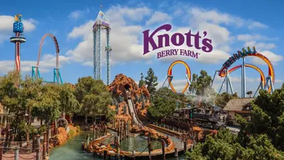 a roller coaster at a theme park with a rollercoaster at The Mandarin at Main Place - Free Disney Gift Gard in Orange