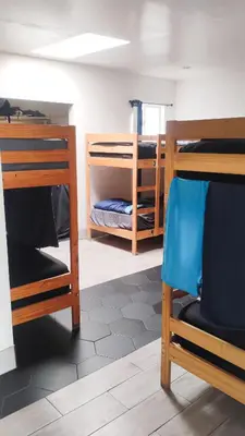 a room with two bunk beds and a desk at Soul in Los Angeles close to Downtown in Los Angeles