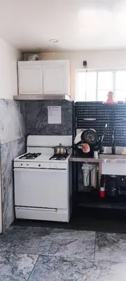 a kitchen with a white stove and a sink at Soul in Los Angeles close to Downtown in Los Angeles