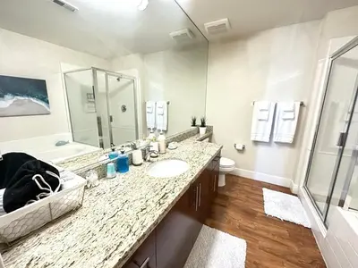 a bathroom with a sink and a shower and a toilet at 2 King Beds DTSM! Walk to Pier, Promenade & Beach in Los Angeles