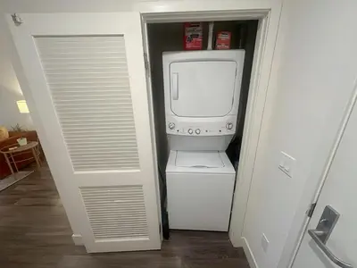 a door leading into a room with a computer in it at 2 KING BED SUITE WALK to BEACH,PIER, PROMENADE in Los Angeles