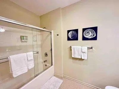 a bathroom with a shower and a glass shower stall at Heart of DT SM Studio, Walk To Beach & Pier in Los Angeles