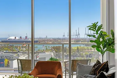 a living room with a view of a city at Marbella Lane - Panoramic Splendid Ocean Views in Long Beach