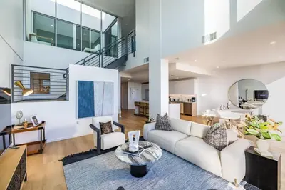 a living room with a couch and a table at Marbella Lane - Luxurious 3BR Penthouse in Long Beach
