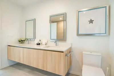 a bathroom with a sink and a toilet at Marbella Lane - Luxurious 3BR Penthouse in Long Beach