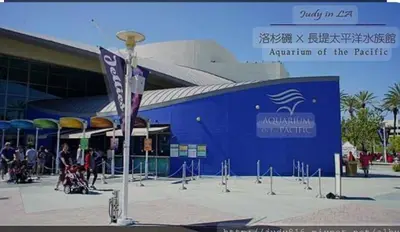 an aquarium of the pacific sign in front of a building at Marbella Lane - Lovely DWNTN Getaway LongBeach in Long Beach