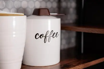 two white coffee cups sitting on a wooden shelf at Cozy Private 1BR Near LAX & SoFi, Pet-Friendly in Los Angeles