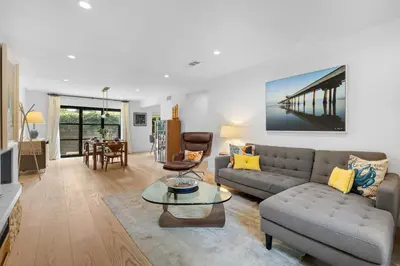 a living room with a couch and a table at New Listing Venice Villa by Colby & Conrad in Los Angeles