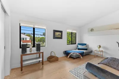 a living room with a couch and a table at New Listing Venice Villa by Colby & Conrad in Los Angeles