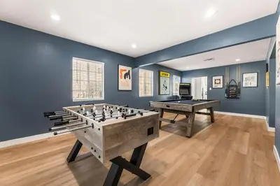 a game room with a table and chessboard at Charming LA Gem by SOFI, Games & Close to it ALL in Los Angeles