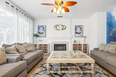 a living room with a couch and a coffee table at Luxury Hilltop Home Spacious Private Backyard in Rowland Heights