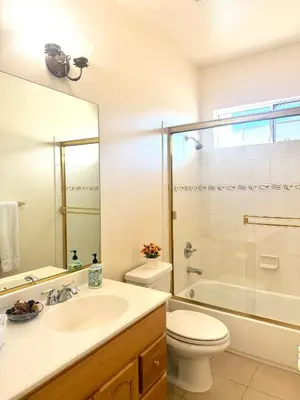 a bathroom with a sink and a toilet and a shower at Spacious 3BR 3BA Home 3 Car Garage Garden Near DTLA Pasadena Hollywood in Alhambra