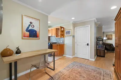 a living room with a table and a kitchen at New Listing Burbank Retreat by Colby & Conrad in Burbank