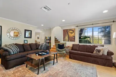 a living room with a couch and a table at New Listing Burbank Retreat by Colby & Conrad in Burbank