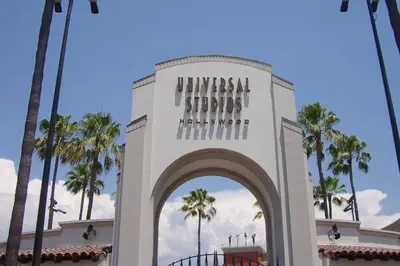 a building with a sign that reads universal strategies headquarters at Secret Stairs Family in Los Angeles