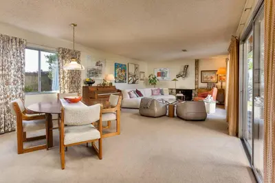 a living room with a table and a couch at NEW Vintage Canyon Retreat in Mount Washington in Los Angeles